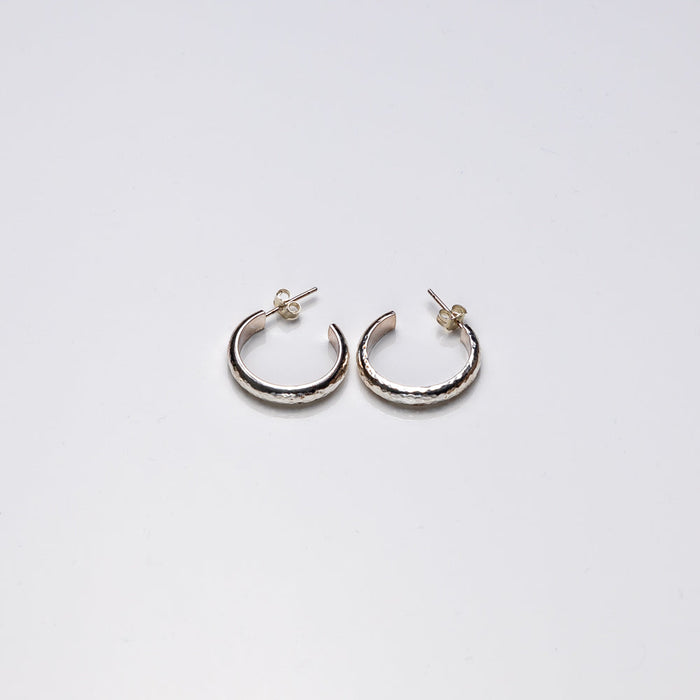 Hammered sterling silver hoop earrings by Purple Butterfly Studios