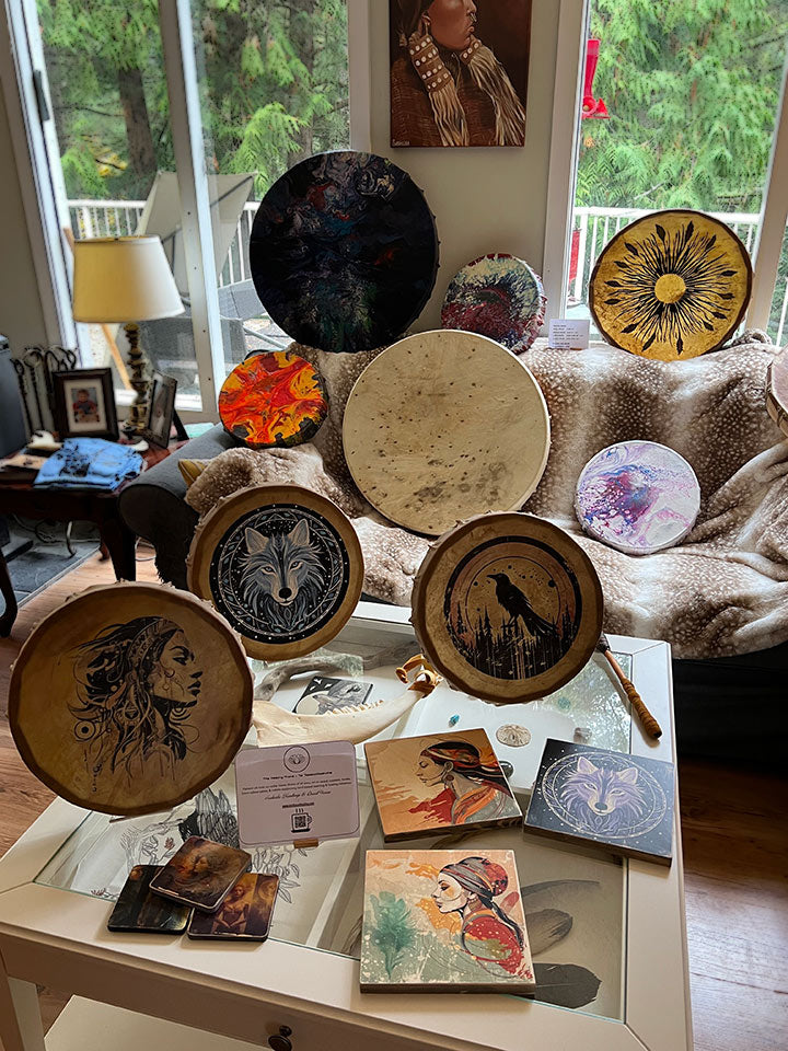 Hand drums by The Healing Place Foundation, elk hide stretched over cedar frames, built by David Fierro and painted by Susheela Kundargi.