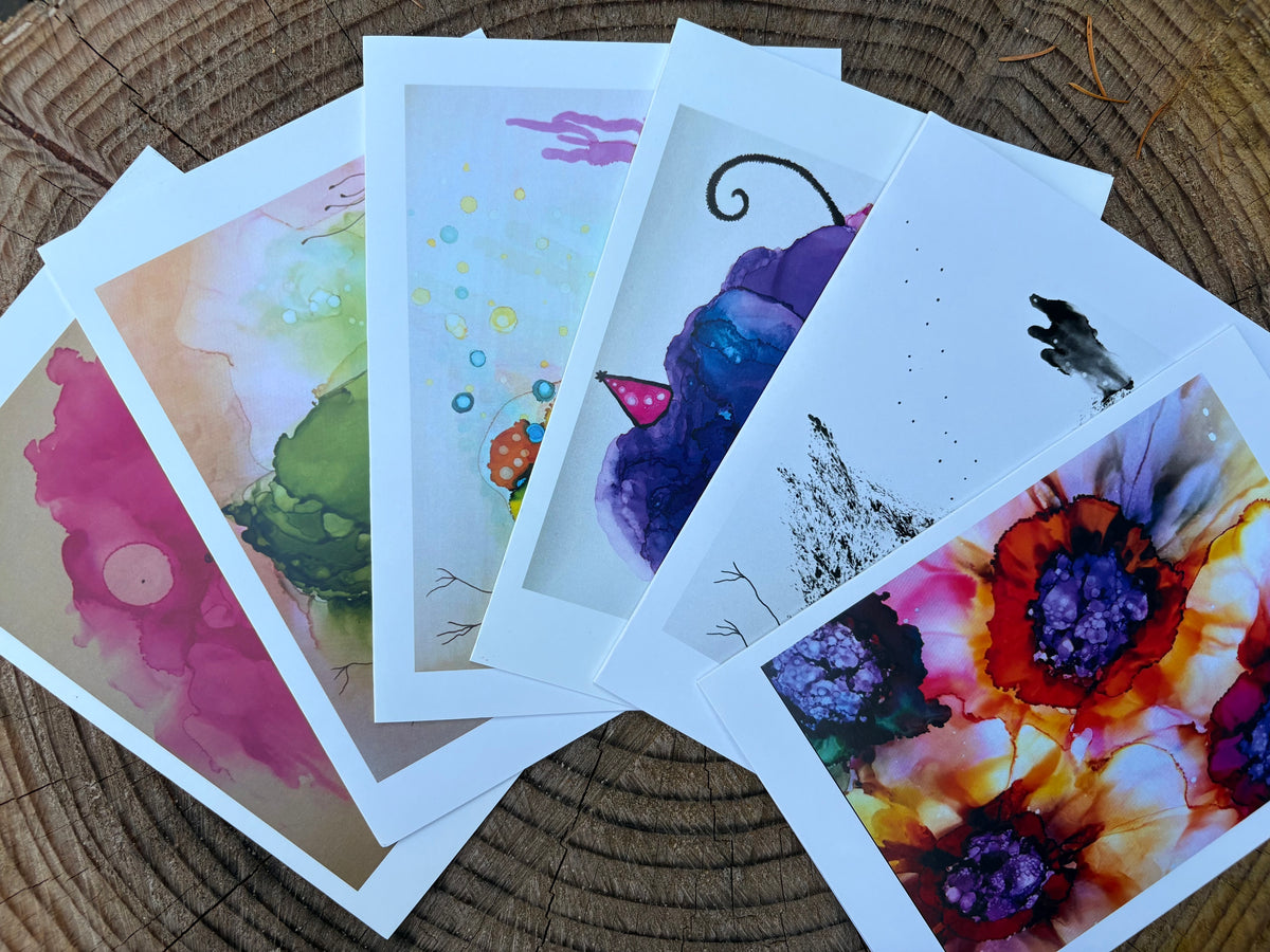 Art cards featuring alcohol ink paintings by Cole Carter