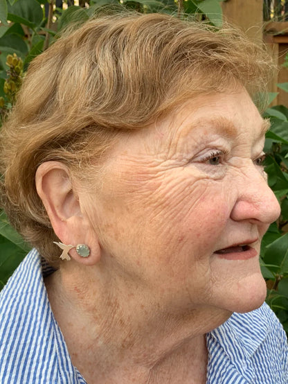 lady wearing sterling silver hummingbird earrings by purple butterfly studios